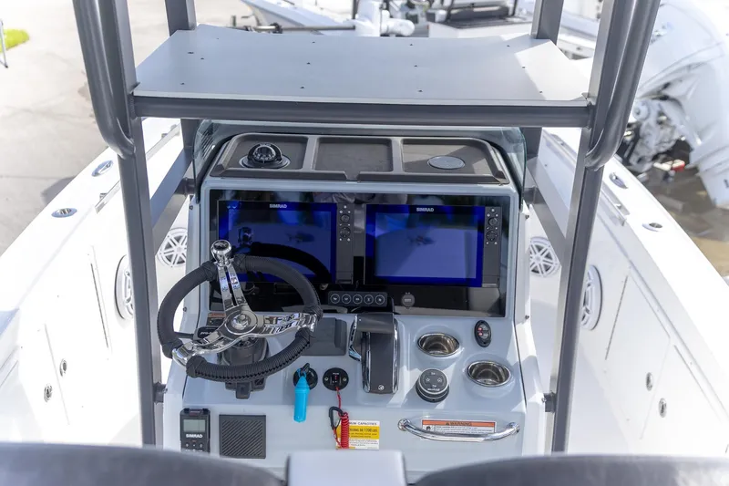  Yacht Photos Pics 2024 Crevalle 26 HCO boat dashboard with dual Simrad displays and modern controls.