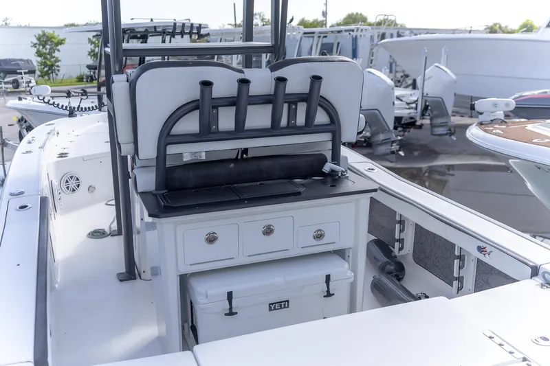  Yacht Photos Pics 2024 Crevalle 26 HCO boat interior with rod holders and storage compartments.