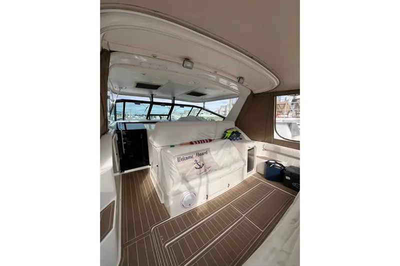 Summah Sled Yacht Photos Pics Interior of 1999 Tiara Yachts 4000 Express, featuring spacious seating and elegant design.