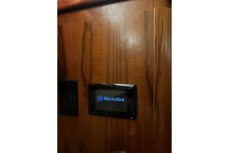 Summah Sled Yacht Photos Pics MarinAire control panel on 1999 Tiara Yachts 4000 Express wooden interior.