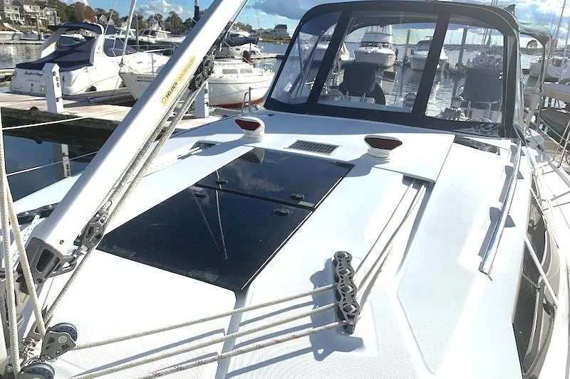Sweet & Salty Yacht Photos Pics 2011 Hunter 39 sailboat docked at marina, featuring sleek deck design and rigging.