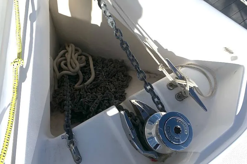 Sweet & Salty Yacht Photos Pics Anchor chain and winch on a 2011 Hunter 39 sailboat deck.