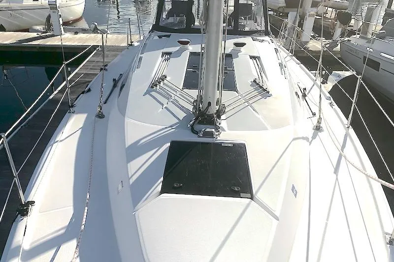 Sweet & Salty Yacht Photos Pics 2011 Hunter 39 sailboat deck view at marina, showcasing sleek design and rigging.