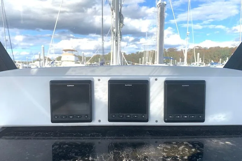 Sweet & Salty Yacht Photos Pics Control panel of a 2011 Hunter 39 sailboat with Garmin displays.