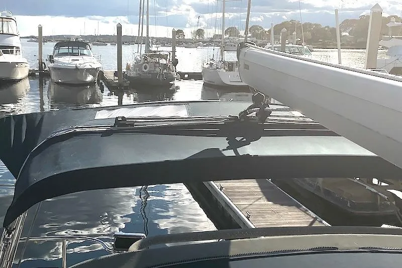 Sweet & Salty Yacht Photos Pics Sailboats docked at a marina, featuring a 2011 Hunter 39 sailboat.