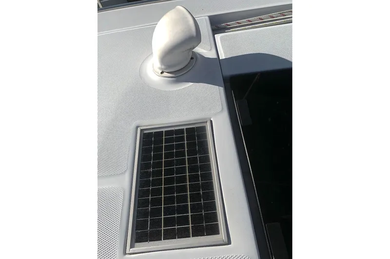 Sweet & Salty Yacht Photos Pics Solar panel and vent on 2011 Hunter 39 yacht deck.