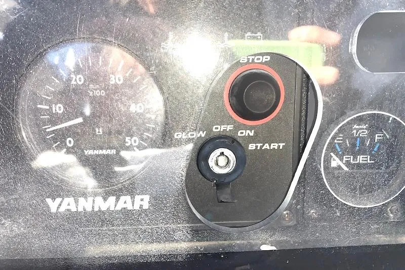 Sweet & Salty Yacht Photos Pics Control panel of a 2011 Hunter 39 with Yanmar engine gauges and ignition switch.