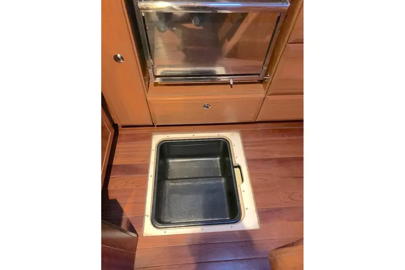 Sweet & Salty Yacht Photos Pics Floor storage compartment in 2011 Hunter 39 yacht kitchen area.