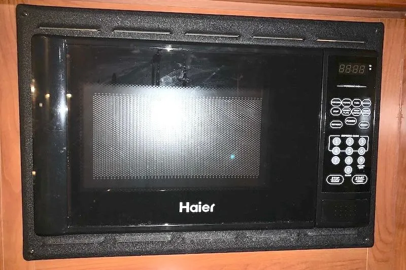 Sweet & Salty Yacht Photos Pics Built-in Haier microwave in a 2011 Hunter 39 RV kitchen.