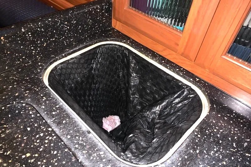 Sweet & Salty Yacht Photos Pics Black trash bin in speckled countertop, Hunter 39 yacht, 2011 model.