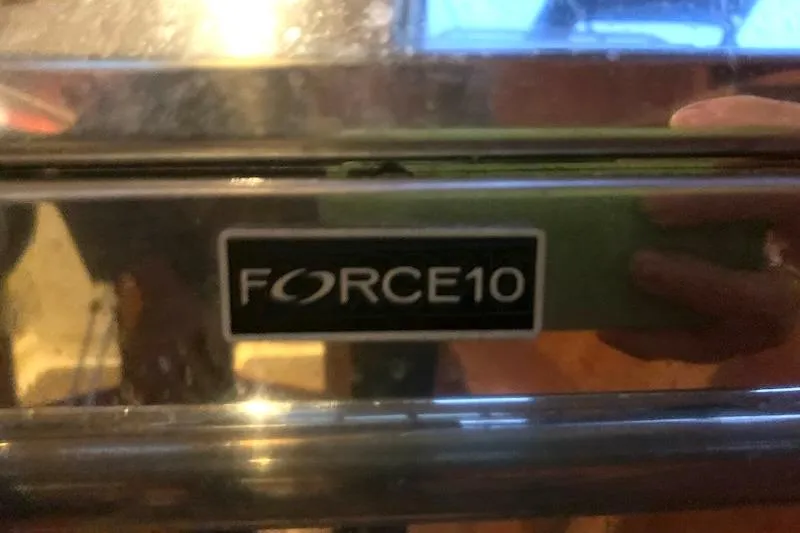 Sweet & Salty Yacht Photos Pics Force 10 label on Hunter 39, 2011 model, reflective surface.