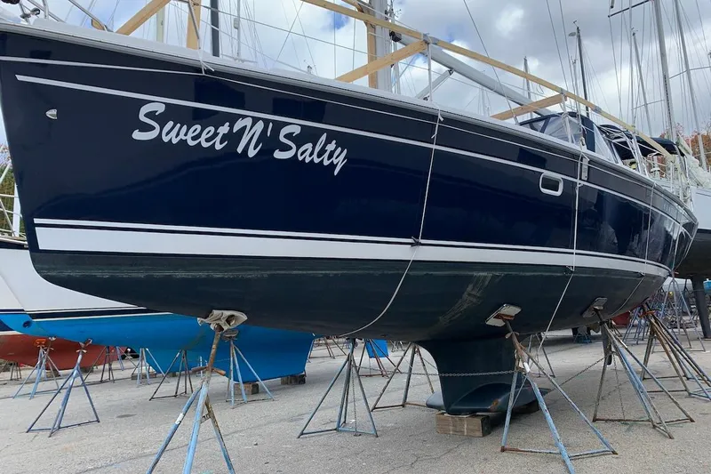 Sweet & Salty Yacht Photos Pics 2011 Hunter 39 sailboat "Sweet N' Salty" on stands in a boatyard.
