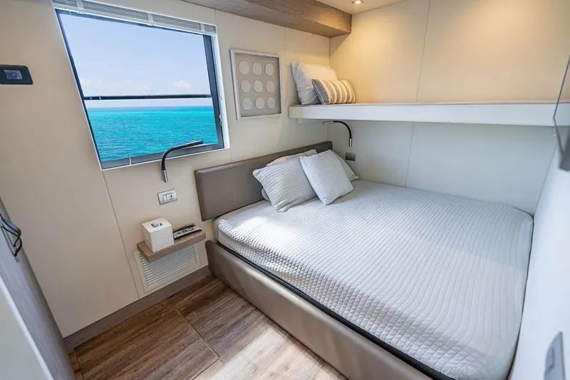 Persistence Yacht Photos Pics Interior of Overblue 58 Power Catamaran, bedroom with ocean view.