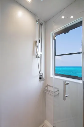 Persistence Yacht Photos Pics Shower in Overblue 58 Power Catamaran with ocean view.