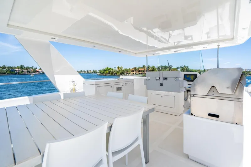 Persistence Yacht Photos Pics Deck of 2017 Overblue 58 Power Catamaran with dining table and grill.