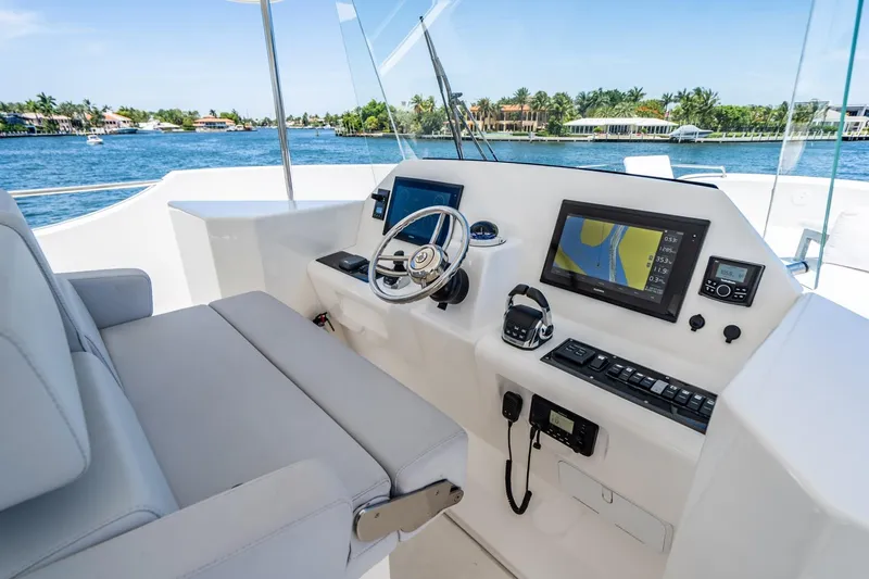 Persistence Yacht Photos Pics Helm of 2017 Overblue 58 Power Catamaran with modern navigation equipment.