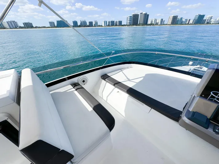  Yacht Photos Pics Galeon 420 Fly 2016 yacht deck with ocean view and city skyline.