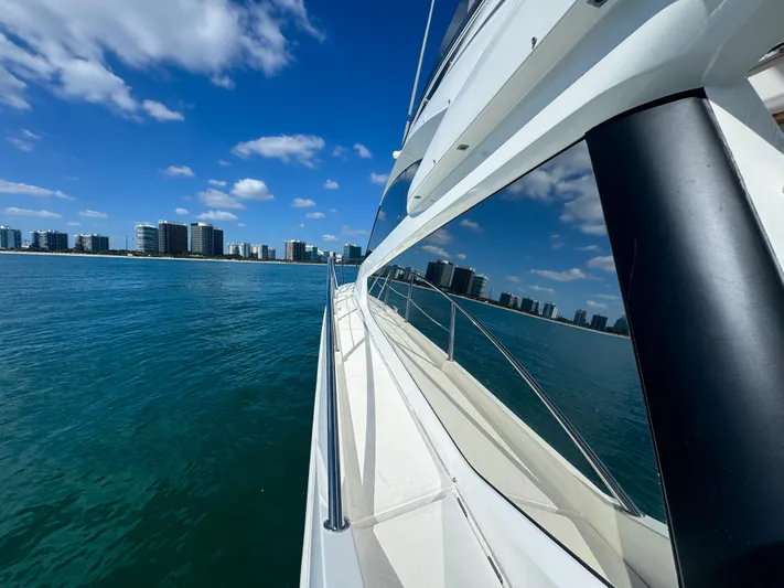  Yacht Photos Pics Galeon 420 Fly yacht cruising near city skyline, 2016 model.