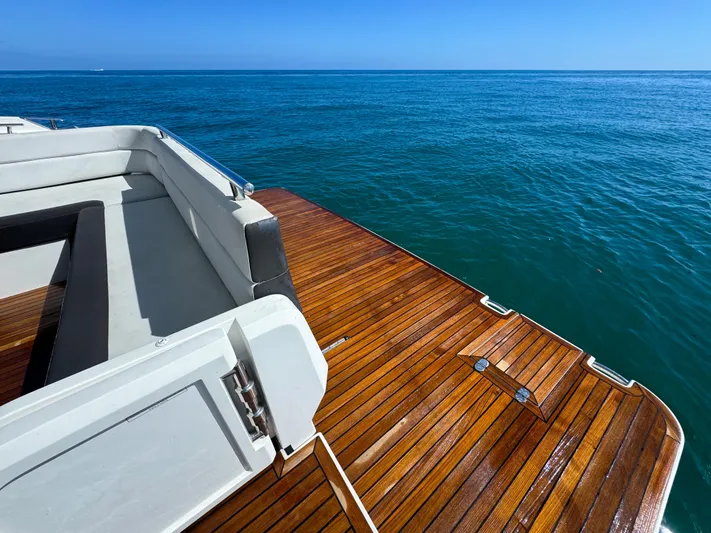  Yacht Photos Pics Galeon 420 Fly 2016 yacht deck with ocean view, featuring sleek wooden finish.