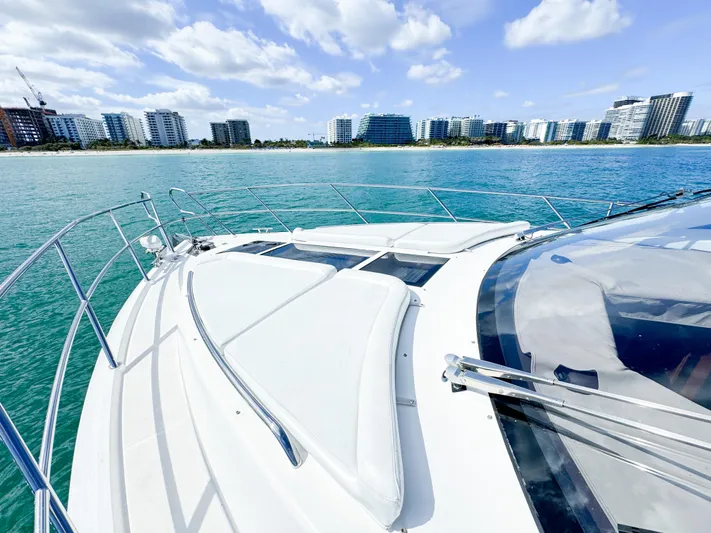  Yacht Photos Pics Galeon 420 Fly 2016 yacht cruising near modern city skyline.