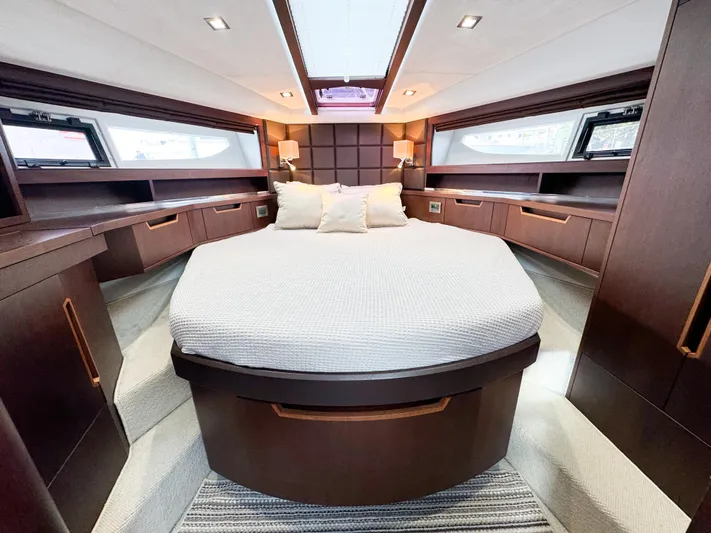  Yacht Photos Pics Luxurious cabin interior of 2016 Galeon 420 Fly yacht with elegant wood finish.