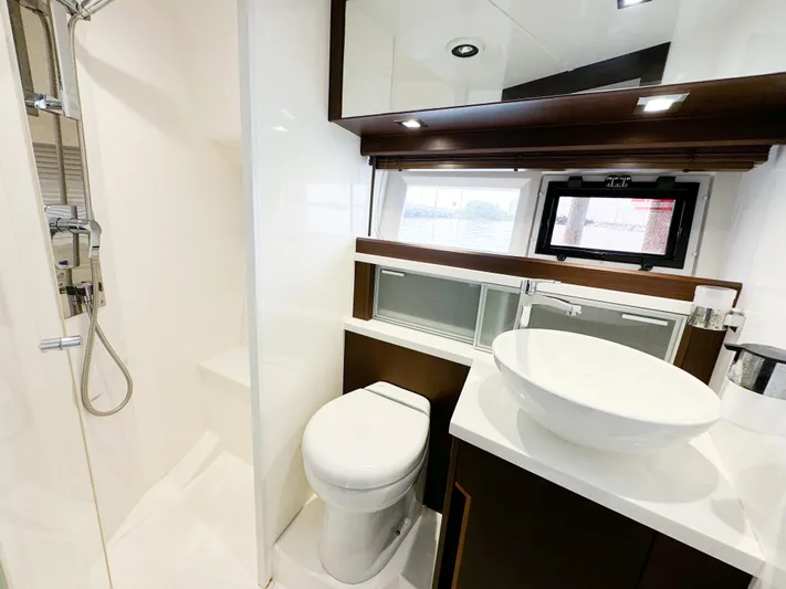  Yacht Photos Pics Luxurious bathroom in 2016 Galeon 420 Fly yacht with modern fixtures and elegant design.