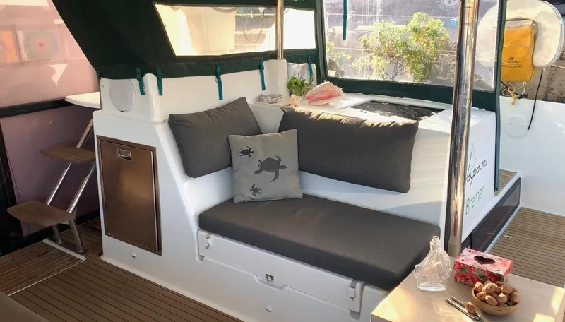 Jajapami Yacht Photos Pics Cozy seating area on 2017 Fountaine Pajot SABA 50 catamaran with cushions and decor.