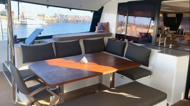 Jajapami Yacht Photos Pics Luxurious 2017 Fountaine Pajot SABA 50 yacht interior with elegant dining area.