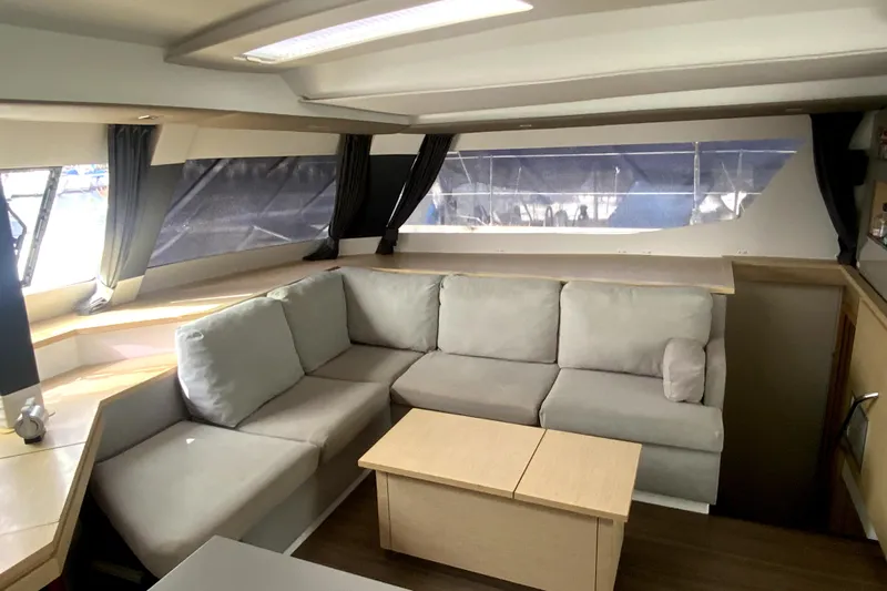 Jajapami Yacht Photos Pics Luxurious interior of 2017 Fountaine Pajot SABA 50 catamaran with cozy seating area.