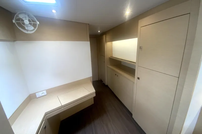 Jajapami Yacht Photos Pics Interior of 2017 Fountaine Pajot SABA 50 yacht, featuring modern cabinetry and sleek design.