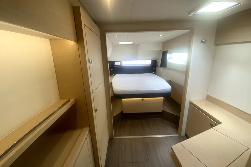 Jajapami Yacht Photos Pics Interior of 2017 Fountaine Pajot SABA 50 yacht, featuring a cozy bedroom with modern design.