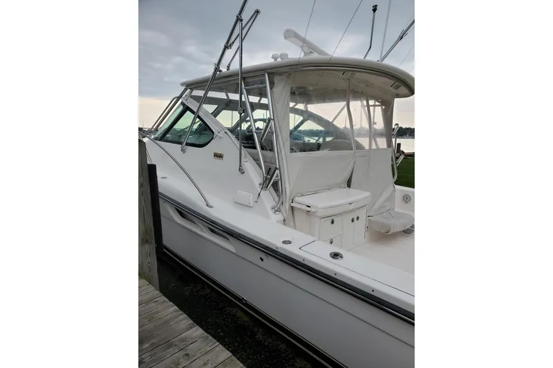  Yacht Photos Pics 2006 Tiara Yachts 3600 Open docked, showcasing sleek design and spacious deck.