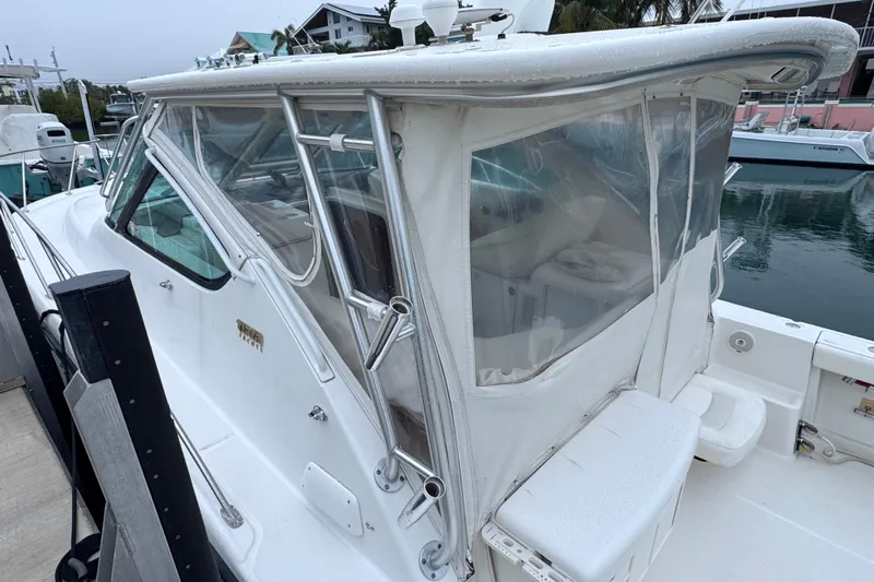  Yacht Photos Pics 2006 Tiara Yachts 3600 Open with enclosed cockpit, docked at marina.