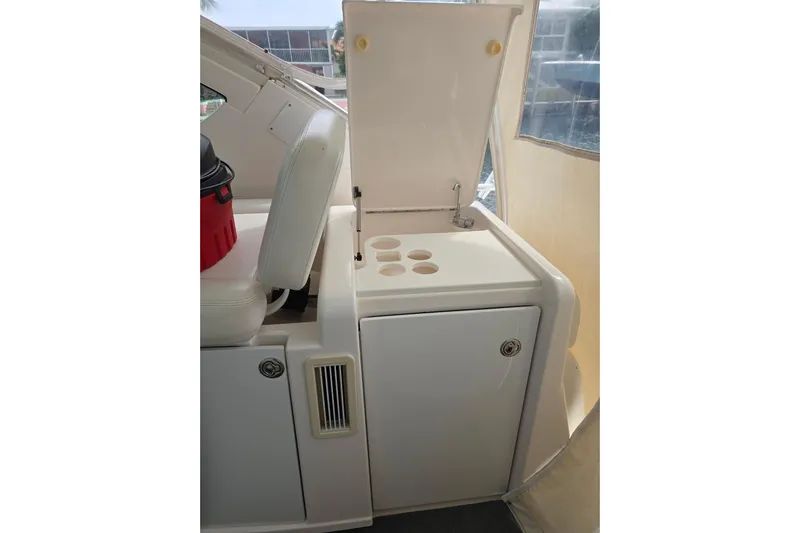  Yacht Photos Pics 2006 Tiara Yachts 3600 Open interior with seating and storage compartment.