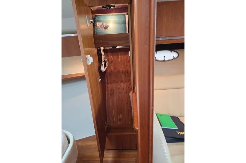  Yacht Photos Pics 2006 Tiara Yachts 3600 Open interior with wooden cabinetry and seating area.