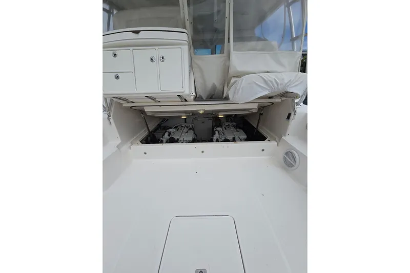 Yacht Photos Pics 2006 Tiara Yachts 3600 Open engine compartment with open hatch and storage cabinets.