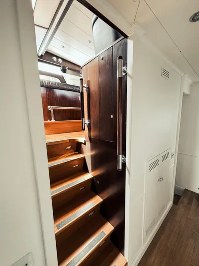 Laziza Yacht Photos Pics Staircase on 2004 Benetti Sail Division 82 RPH yacht, featuring wooden steps and modern design.