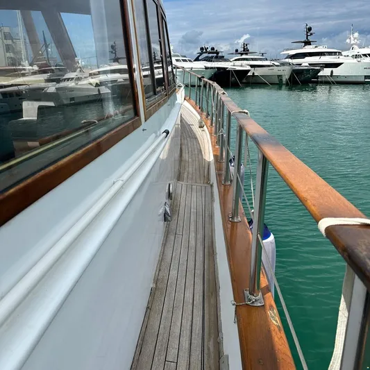  Yacht Photos Pics Side view of 1994 Viking Marin Caicco yacht docked in marina.