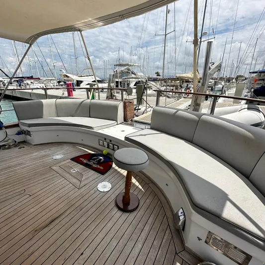  Yacht Photos Pics Spacious deck seating on 1994 Viking Marin Caicco yacht, docked at marina.