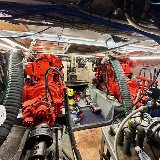  Yacht Photos Pics Engine room of a 1994 Viking Marin Caicco with red machinery and hoses.