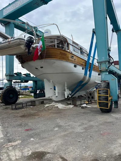  Yacht Photos Pics Viking Marin Caicco 1994 yacht in dry dock, Italian flag, maintenance underway.