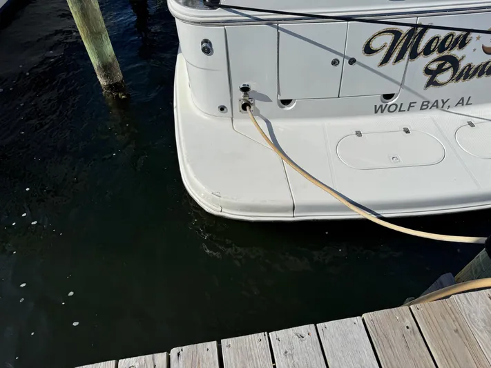  Yacht Photos Pics Rear view of 2007 Carver 46 Voyager docked at Wolf Bay, AL.