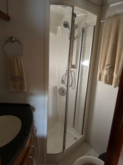  Yacht Photos Pics Bathroom interior of 2007 Carver 46 Voyager yacht with shower and sink.