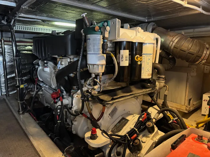  Yacht Photos Pics Engine room of a 2007 Carver 46 Voyager yacht, showcasing mechanical components.