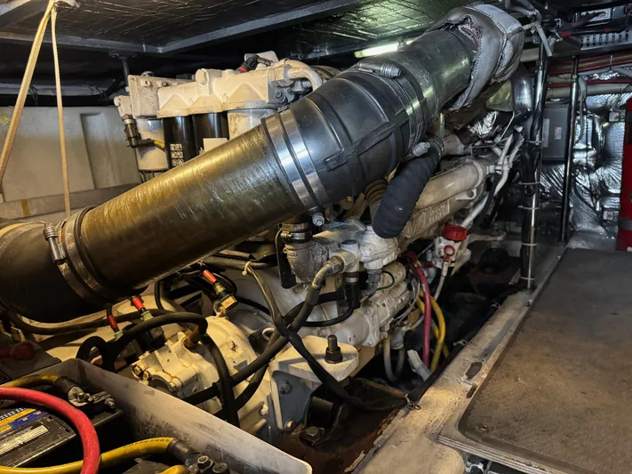  Yacht Photos Pics Engine room of 2007 Carver 46 Voyager yacht, showcasing complex machinery and components.