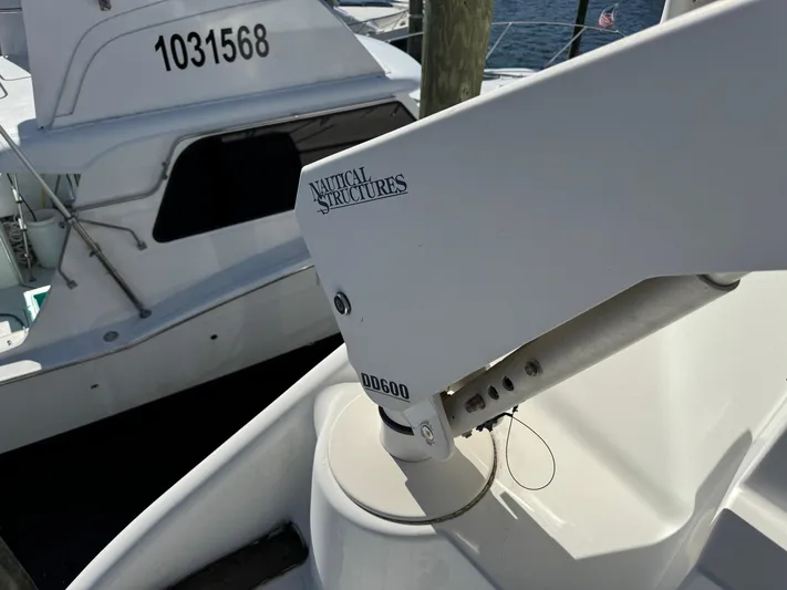  Yacht Photos Pics Nautical Structures equipment on 2007 Carver 46 Voyager yacht, docked near another boat.