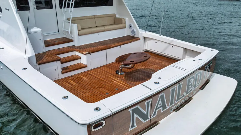 Nailed It Yacht Photos Pics Luxury Viking 74EB yacht deck with teak flooring and seating, 2008 model.