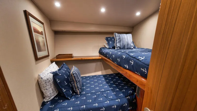 Nailed It Yacht Photos Pics Cozy bunk beds in 2008 Viking 74EB yacht cabin with nautical-themed bedding.