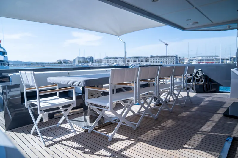 Aquila Yacht Photos Pics Luxury yacht deck with seating, Mengi Yay 36M Pennon, 2015 model, docked at marina.