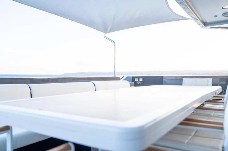 Aquila Yacht Photos Pics Luxurious dining area on 2015 Mengi Yay 36M Pennon yacht with ocean view.